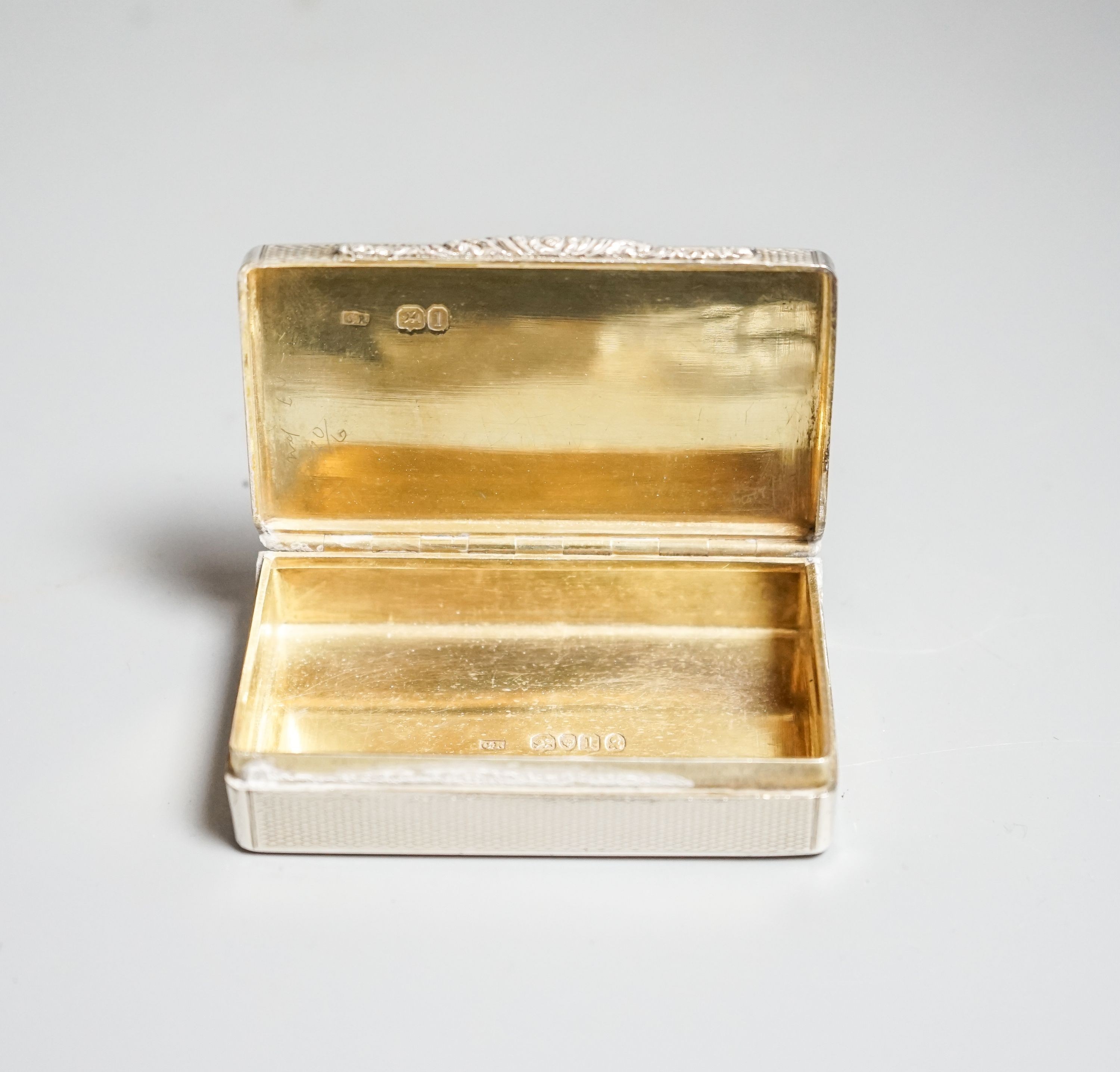 A George IV engine turned silver snuff box, Christian Reid, London, 1826, 72mm.